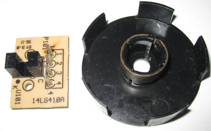 Image of a 14LG410A circuit board and encoder wheel